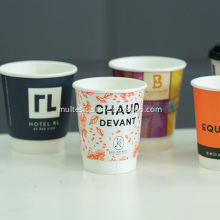 High speed machine produced double wall paper cup